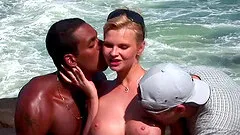 Tarra White is still laying on the beach, naked after her lesbian lovemaking