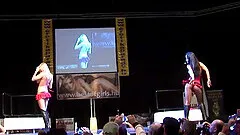 extreme horny european dancers doing hot cock sharing blowjob on a public sex fair show stage