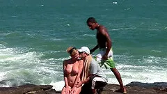 Amazing interracial threesome on a beach with hot babe Tarra White