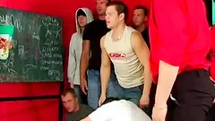 Naughty babe with glasses attacked by a bunch of randy men