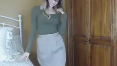 Blonde with glasses striping and blowing her dildo