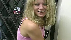 Small-titted hottie with blonde hair gets completely naked on camera