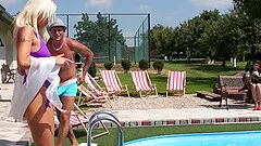 Horny couple seduces their clothed hot friend by the swimming pool