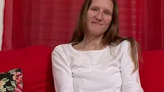 Mature ginger-haired beauty playing with her shaved fuck hole