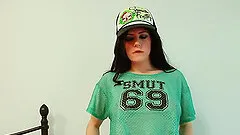 Sporty young slut shoves a dildo in her tight slit