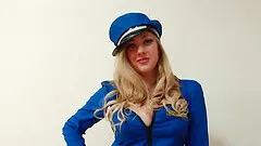 Busty policewoman strips and fingerfucks her pussy