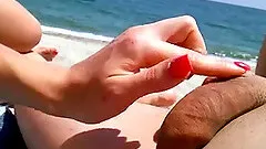 Girl trying to get boner on beach