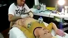 Girl get her pussy tattoo