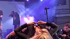 Hot blonde busty MILFs dildo show on public sexfair show stage