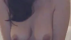 Babe with delicious boobs toying herself and sucking her toy