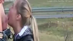 Blonde gives a public blowjob