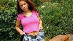 Lovely Dutch teenager toys with her aching cunt outdoors