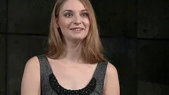 Pale chick tries to smile as the guy plays with her private parts