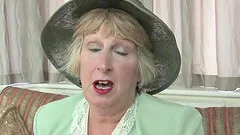 Classy grandmother strips down and rams her pussy with a toy