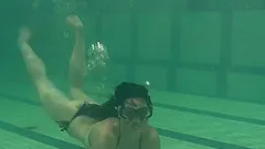 Small tits brunette teen performing her teases in the pool