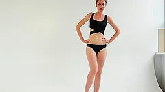 Fit babe really enjoys stretching her smoking hot body