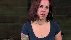 Tattooed slaved maiden in bondage with natural tits receiving the pleasure of toy