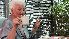 Naughty grandmother strips down and fingers her wet cunt