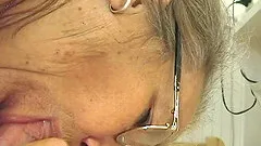 Granny with glasses is ready to suck it and to be drilled hard