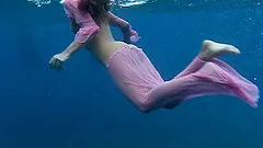 Two sexy babes strip down while diving in the ocean