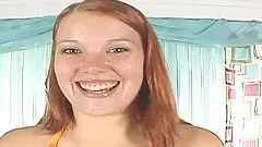 Pretty redhead with large hooters is ready to do the cock sucking