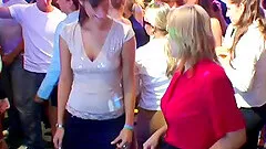 Lovely chicks expose their juicy tits and tight bras in a club's party