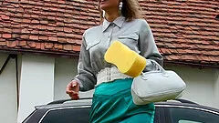 Right on the car's hood,two nasty lesbians enjoy washing and exposing their asses