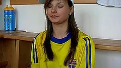 Teen soccer fan in a sporty jersey fucks a dildo into her cunt