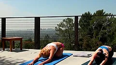 Two petite chicks stop their yoga session in order to get screwed hard