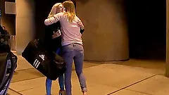 Red hot blonde cowgirl showing off her sexy tits in public