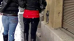 Hot girls go outside and play around in the cold snow