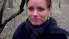 Happy girl gladly gives a blowjob while out for a walk in the park