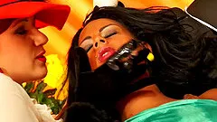 Two alluring lesbians whine in pleasure while teasing their muffs with a vibrator