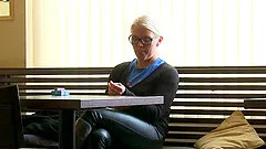 Blonde girl in glasses gives a guy head in a public place