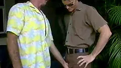 Hot guy with a hairy chest gives a sexy vintage gay blowjob