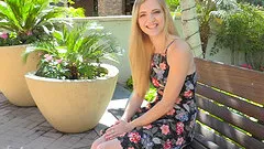 Gorgeous blonde rubs her cunt seductively in a public shoot