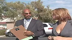 Tall man with a big black cock fucks a busty slut