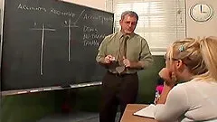 Blonde with glasses sucking an old man's cock