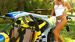 While outdoors a model gets fucked by a race car driver