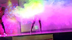 Wild girls dance, strip and fuck on stage at a club party