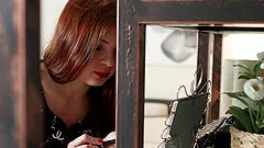 Redhead in pretty dress and stockings makes love to her man