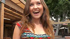 Pretty dress on a pussy flashing brunette girl in public