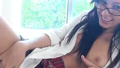 Sexy, geeky college girl fingers herself while in uniform