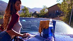 She cleans his car then uses her mouth to clean his cock