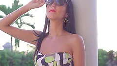 Hypnotic brunette senorita exposes her private parts by the pool