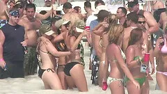 Boat party on a beach with hundreds of hot girls all around