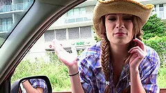 Cowgirl gets in the car and slobbers all over his dick