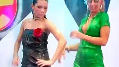 Girls gets naked and wet in a shower at a nightclub