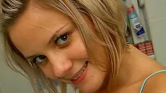 Naughty teen hides in the toilet and toy fucks her muff in a solo show