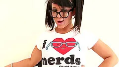 A sexy, geeky coed reams her pussy out with a dildo